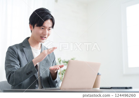 Business people having an online meeting on a computer 124496260