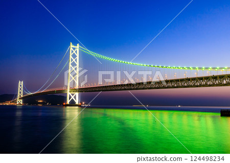 The illuminated Akashi Kaikyo Bridge seen from Maiko Park in spring in Kobe, Hyogo Prefecture The illuminated Akashi Kaikyo Bridge seen from Maiko Park in spring in Kobe, Hyogo Prefecture 124498234