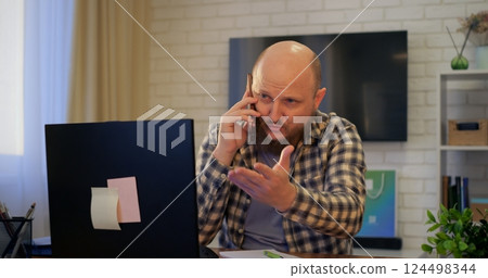 Man balancing work calls and personal conversations, balance evident in multitasking, balance essential for remote work efficiency, perfect for lifestyle and business content. 124498344