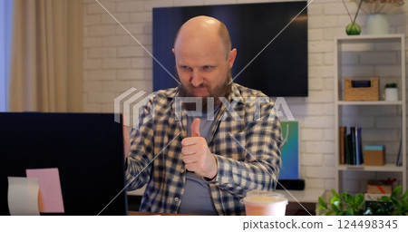 Man utilizing digital tools for effective communication, tools enhancing remote collaboration, tools key to workplace efficiency, perfect for business and technology-related content. Man utilizing digital tools for effective communication, tools enhancing remote collaboration, tools key to workplace efficiency, perfect for business and technology-related content. 124498345