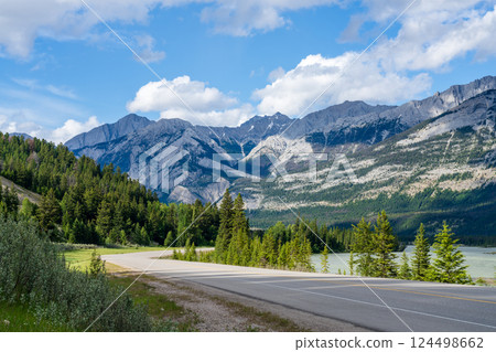 Yellowhead Highway and Athabasca River in Jasper National Park, Alberta, Canada. Breathtaking Scenic View in the Canadian Rockies Yellowhead Highway and Athabasca River in Jasper National Park, Alberta, Canada. Breathtaking Scenic View in the Canadian Rockies 124498662