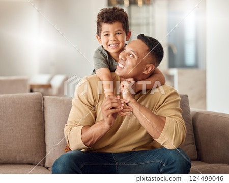 Father, child and sofa with smile, back and together for portrait, happy and home in living room. Family, dad and boy on couch for bonding, playing and happiness in lounge for time, love and relax 124499046