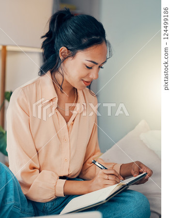 Woman, book and writing on bed for planning, dream or goal in bedroom while home. Girl, notebook and paper with smile, happy and thinking of motivation, strategy or vision for life, career or idea Woman, book and writing on bed for planning, dream or goal in bedroom while home. Girl, notebook and paper with smile, happy and thinking of motivation, strategy or vision for life, career or idea 124499186