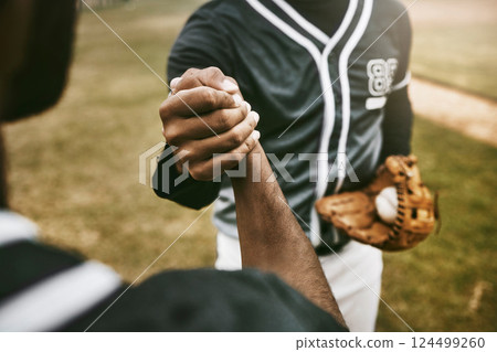 Baseball, handshake and men shaking hands to welcome, thank you or respect before a sports game or match start. Teamwork, collaboration and baseball players greeting in exercise or training outdoor Baseball, handshake and men shaking hands to welcome, thank you or respect before a sports game or match start. Teamwork, collaboration and baseball players greeting in exercise or training outdoor 124499260