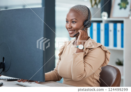 Call center, contact us and happy consultant in communication, helping and talking in customer services. Smile, telemarketing and black woman networking and speaking to a client at a support desk 124499299
