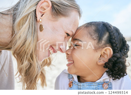 Mother, girl and smile with love, happy and care together outdoor while bonding on holiday in summer. Parent, adoption child and play with love, happiness and care on relax family vacation in Brazil 124499314