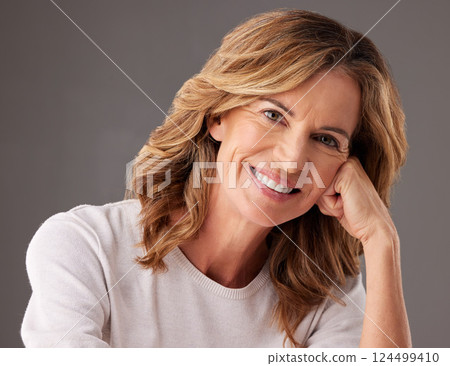 Beauty, mature woman and happy wellness, aesthetic or natural makeup, skincare or clean cosmetics on grey studio background. Portrait of smile elderly female model face, healthy hair or skin wellness 124499410