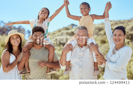 Big family, happy and portrait smile in nature for fun quality bonding time in summer vacation in the outdoor. Mother, father and kid with grandparents happiness together in joy for family holiday 124499411