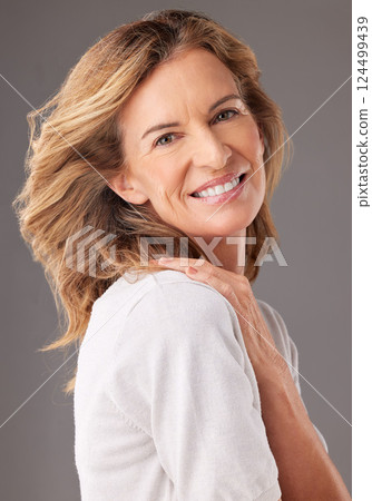 Skincare, beauty and portrait of senior woman with confidence, natural beauty and smile. Old woman posing for anti aging beauty products, dermatology care and skin wellness on gray background studio Skincare, beauty and portrait of senior woman with confidence, natural beauty and smile. Old woman posing for anti aging beauty products, dermatology care and skin wellness on gray background studio 124499439