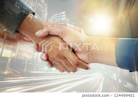 Business people, shaking hands and city overlay, welcome and thank you of people in collaboration. Double exposure, success and b2b partnership handshake, teamwork or trust, deal or crm agreement. Business people, shaking hands and city overlay, welcome and thank you of people in collaboration. Double exposure, success and b2b partnership handshake, teamwork or trust, deal or crm agreement. 124499481