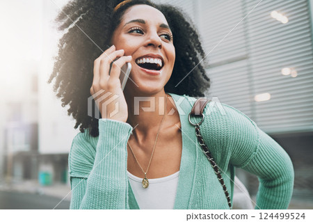 Happy, phone call and black woman in a street, smile and talking while walking in city in New York. Student, travel and laughing with girl chatting on a phone, excited and cheerful while traveling 124499524