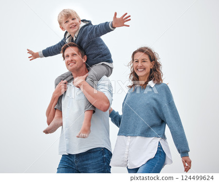 Dad, boy and shoulders for walk, family and smile together outdoor in sunshine with happiness. Father, mother and child in summer, happy and walking for bonding, relax and love on vacation in Madrid 124499624