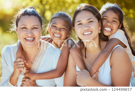 Family, portrait and women relax in a park, bonding with children, mother and grandmother in nature. Love, happy family and kids hug, smile and embrace mom and granny playing in a garden in Mexico 124499657