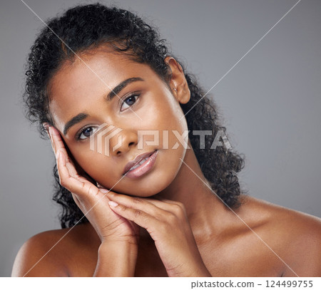 Face makeup, portrait and indian woman skincare with glow from cosmetics against a mockup studio background. Girl model with skin beauty from cosmetic smooth and clean body care with mockup space Face makeup, portrait and indian woman skincare with glow from cosmetics against a mockup studio background. Girl model with skin beauty from cosmetic smooth and clean body care with mockup space 124499755