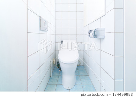 Bright, simple tiled toilet space interior image 124499998