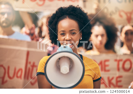 Protest, loud speaker and rally with a woman activist speaking during a march for equality in the city. Freedom, speech and community with a young female protestor in fight for human rights Protest, loud speaker and rally with a woman activist speaking during a march for equality in the city. Freedom, speech and community with a young female protestor in fight for human rights 124500014