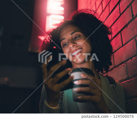 Happy woman, phone and coffee in city at night by building neon lights, social media and online web location search. Young girl smile, mobile communication and 5g tech streaming on smartphone in town 124500078
