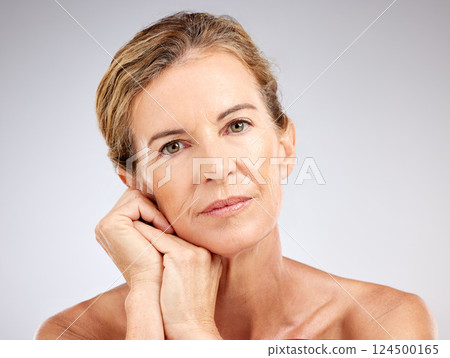 Skincare, beauty and cosmetics for senior woman with dermatology, antiaging and wellness routine against studio background. Lady portrait for wellness, health and facial botox for wrinkle free skin Skincare, beauty and cosmetics for senior woman with dermatology, antiaging and wellness routine against studio background. Lady portrait for wellness, health and facial botox for wrinkle free skin 124500165