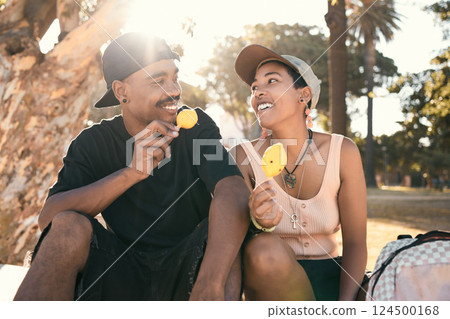 Happy, ice cream and couple in nature talking while on an adventure, holiday and journey in Mexico. Happiness, smile and young man and woman eating a dessert while on an outdoor date on vacation. Happy, ice cream and couple in nature talking while on an adventure, holiday and journey in Mexico. Happiness, smile and young man and woman eating a dessert while on an outdoor date on vacation. 124500168