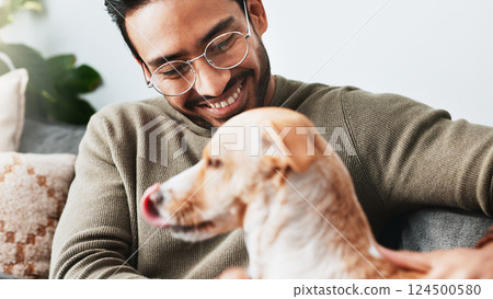 Smile, man and play with pet dog in home for love, care and bonding together as friends or companion with loyalty. Animal, stroke and person in living room on sofa for support, connection and relax Smile, man and play with pet dog in home for love, care and bonding together as friends or companion with loyalty. Animal, stroke and person in living room on sofa for support, connection and relax 124500580