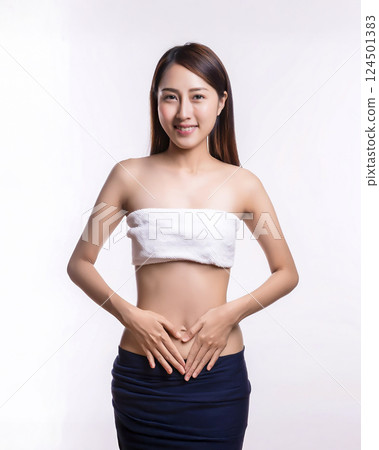 Image of a young woman with her hands on her stomach 124501383