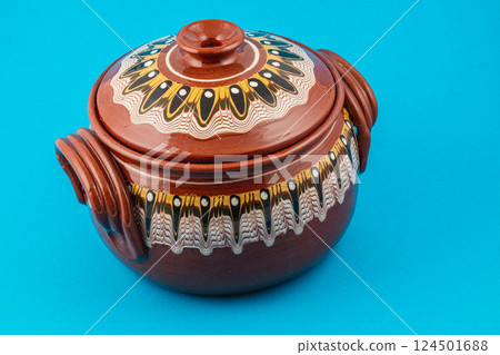 Beautifully crafted traditional ceramic pot with intricate design Beautifully crafted traditional ceramic pot with intricate design 124501688