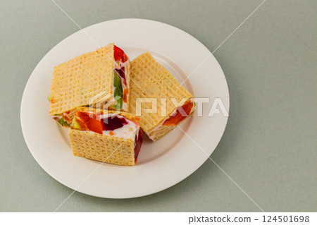Delicious jelly waffle cakes with fresh fruit 124501698