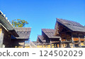 Blue sky and ancient dwellings 124502029