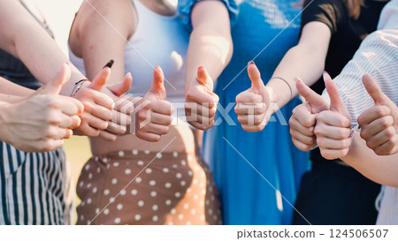 Students join together in celebration, showing unity, agreement, and shared success with positive energy and confidence 124506507