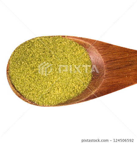 Green tea powder pile isolated on white background 124506592