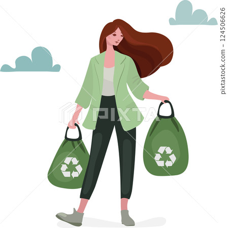Young woman holding two green garbage bags with recycling symbols, representing waste management. 124506626
