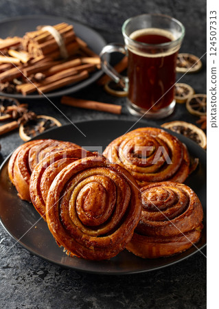 Kanelbullar - Swedish cinnamon buns or rolls. Kanelbullar - Swedish cinnamon buns or rolls. 124507313