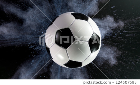 Soccer ball with coloured powder explosion. Soccer ball with coloured powder explosion. 124507593