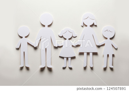 Paper family on white background. Conceptual image of family life. Celebrating International Family Day on May 15. 124507891