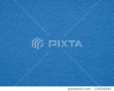 Vibrant sapphire felt surface, echoing with the depth of the ocean and the stillness of the sky 124508093