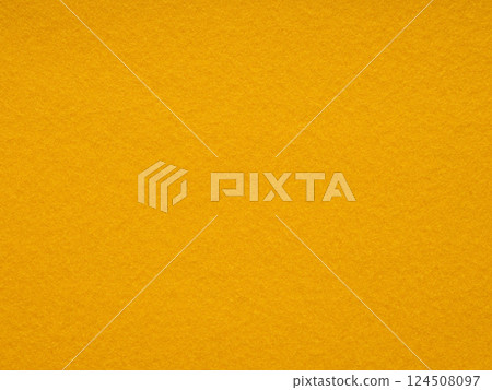 Mustard yellow felt texture emanates warmth and rustic charm, ideal for cozy and inviting design themes Mustard yellow felt texture emanates warmth and rustic charm, ideal for cozy and inviting design themes 124508097