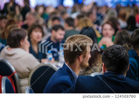 Group of people attending a professional business event or seminar 124508760