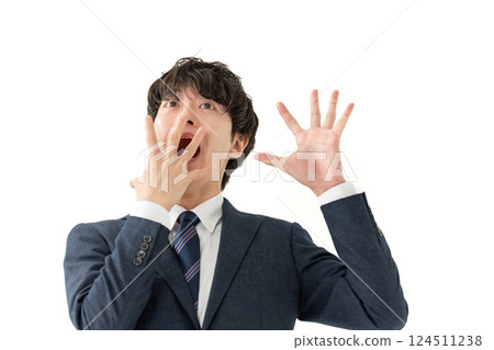 Business man surprised 124511238