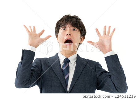 Business man surprised 124511239