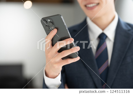 Businessman smartphone hand Businessman smartphone hand 124511316