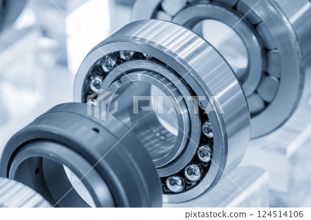 Close up scene the ball bearing parts in the light blue scene. Close up scene the ball bearing parts in the light blue scene. 124514106