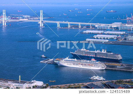 Yokohama cityscape in Japan. View of the departing Noordam. In the foreground is the Asuka II (Seaborne Quest's first arrival) on the 30th. 124515489