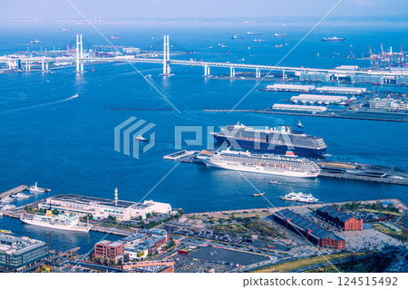 Yokohama cityscape in Japan. View of the departing Noordam. In the foreground is the Asuka II (Seaborne Quest's first arrival) on the 30th. 124515492