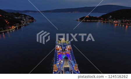 Illuminated cruise ship in sea at night Illuminated cruise ship in sea at night 124516262