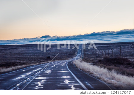Before dawn, Arizona, USA, driving on Route 389, at an altitude above the clouds. Before dawn, Arizona, USA, driving on Route 389, at an altitude above the clouds. 124517047