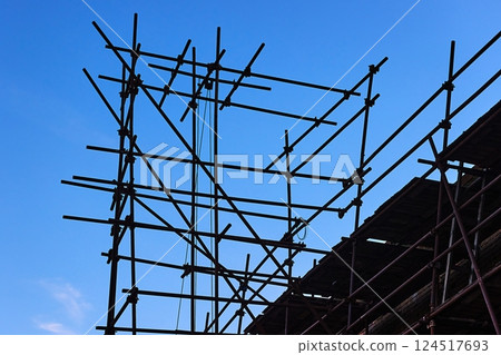 Scaffolding at a construction site looking unsafe 124517693