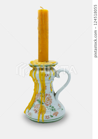 antique candle holder vintage style with handle and candle wax dripping flow down isolated on white antique candle holder vintage style with handle and candle wax dripping flow down isolated on white 124518055
