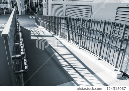 Public ramp, Handicap wheelchair people pass way with safety dot mark for disability in modern city Public ramp, Handicap wheelchair people pass way with safety dot mark for disability in modern city 124518087