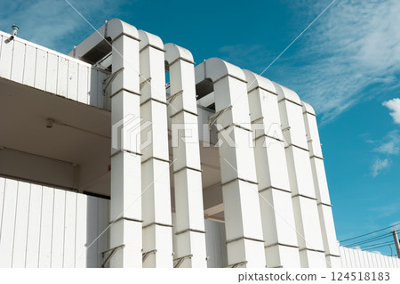 Industry building air ventilate pipeline from odor ventilator system , air flow pipe line pattern from kitchen level to top roof exterior. 124518183