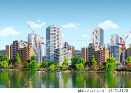 Modern Green City. Metro Skyline business office building around public park fresh clean air. 124518196